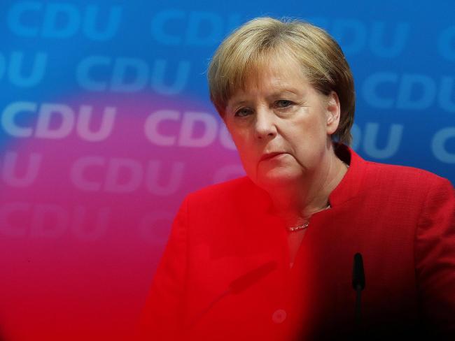 © Bloomberg. Angela Merkel, Germany's chancellor and leader of the Christian Democratic Union (CDU) party, pauses while speaking during a news conference at the CDU headquarters in Berlin, Germany, on Monday, June 18, 2018. Merkel has accepted a two-week deadline over tougher migration policy set by Interior Minister Horst Seehofer, who leads her Bavarian coalition partner, according to a person familiar with the matter. Photographer: Krisztian Bocsi/Bloomberg