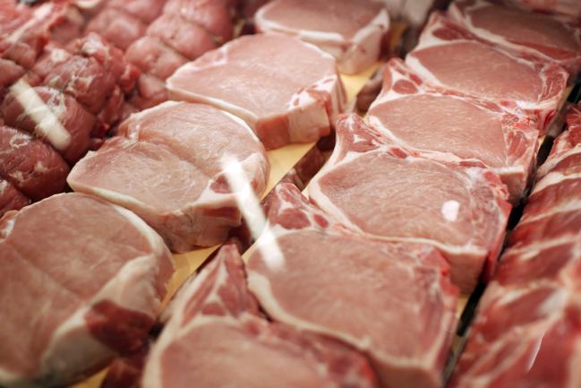 © Bloomberg. Pork chops are displayed for sale during the grand opening of a Whole Foods Market Inc. location in Burbank, California, U.S., on Wednesday, June 20, 2018. Customer traffic was up 2.4 percent at Whole Foods stores during the first five months of 2018, a sign that Amazon has managed to draw in new shoppers with ballyhooed price cuts on a handful of items. 