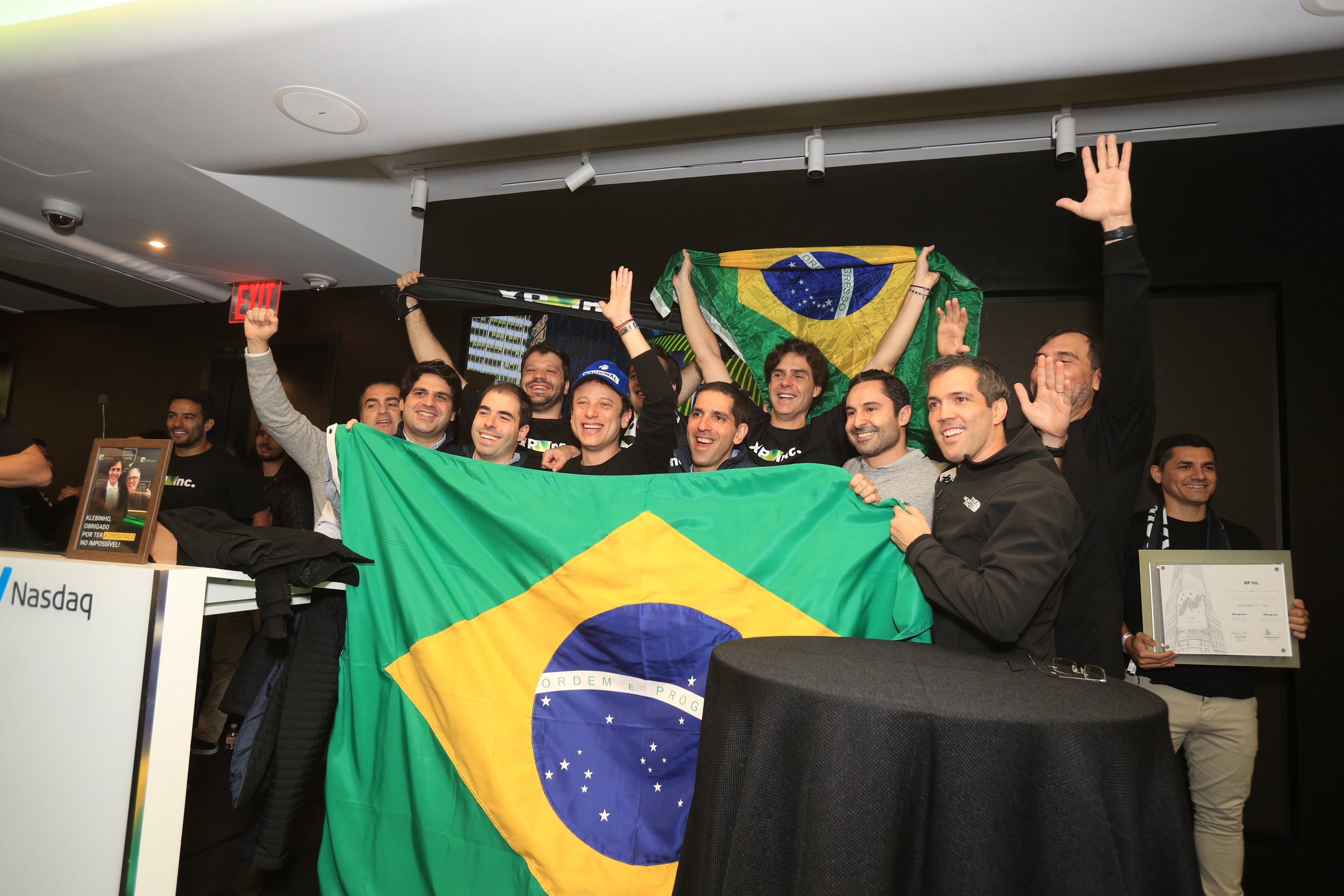 XP estreia na Nasdaq em alta de 20% a US$ 32,75