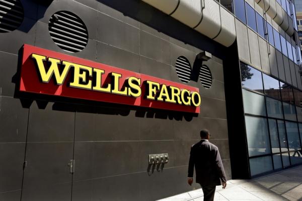 © Reuters. Congressional report says Wells Fargo not complying with regulatory settlements