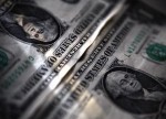 Dólar desacelera com dados dos EUA, após bater máxima com Treasuries e fiscal