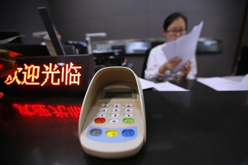 © Reuters. China approves Hengfeng Bank to boost its capital to 11.2 billion yuan