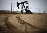 UPDATE 7-Oil rises 2 pct on hopes of market rebalance, trade deal