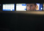 Wall Street se pasa a las ganancias a media sesión y el Dow Jones sube 0,26 %