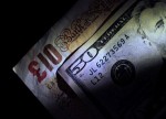 Форекс - Курс GBP/USD вырос к закрытию американских торгов