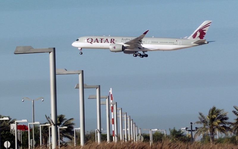 © Reuters. Qatar Airways in talks to buy 49% RwandAir stake, interested in increasing LATAM investment