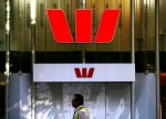 CORRECTED-UPDATE 2-Australia's Westpac cleared of rate rigging but bank inquiry sword stays