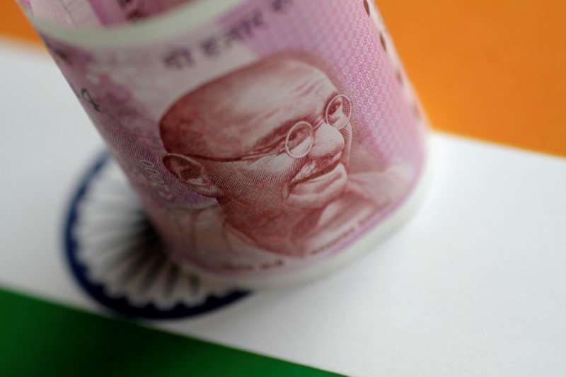 Rupee Tumbles on Worries RBI’s Bond Plan May Add to Money Glut By Bloomberg