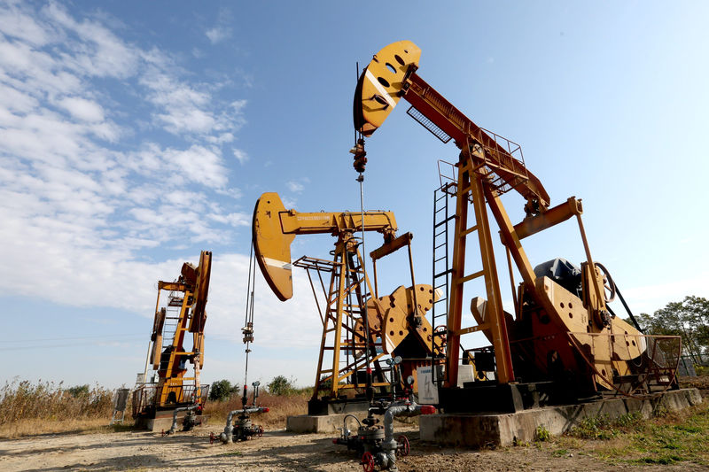 © Reuters. Explainer: Australian minnow Far battles Woodside over West African oil spoils