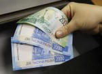 Евро и доллар упали до минимумов за семь месяцев