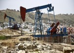 Petróleo em baixa apesar de alerta sobre capacidade disponível, foco em shale oil