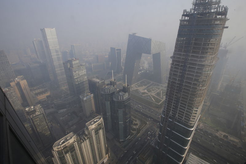© Reuters. China environment facing pressures from economic slowdown: minister