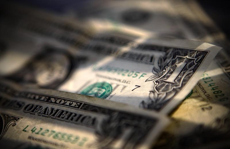 Dollar Edges Lower; Remains Elevated as Yields Rise