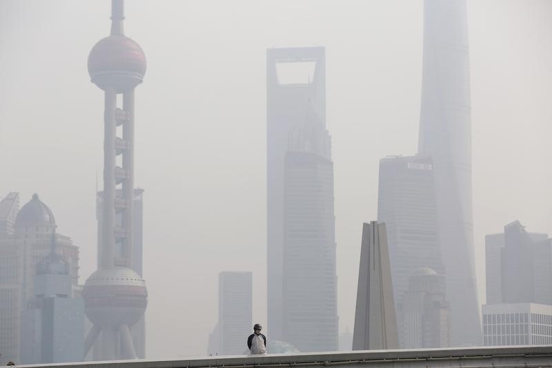 © Reuters. Shanghai-owned state firms to boost investments in next five years: city government