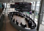 ACÇÕES PORTUGAL-PSI20 em queda com Europa, sector viagens tomba com novas restrições
