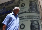 CÂMBIO-Dólar acelera alta com rali da moeda contra emergentes