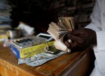 WEEKAHEAD-AFRICA-FX-Nigerian naira to weaken, debt worries seen hurting Zambian kwacha