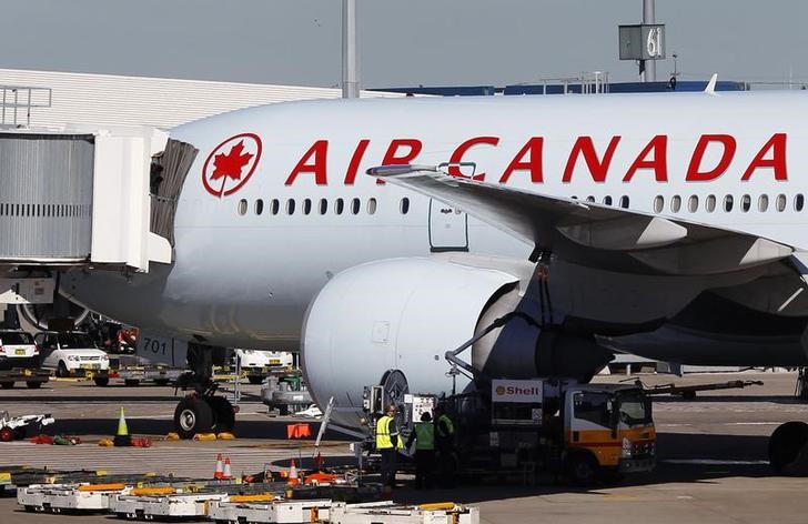 UPDATE 2-Aimia accepts sweetened Air Canada bid for ...