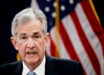 CORRECTED-FOREX-Dollar edges up before Powell's testimony