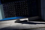 Stocks cautious on trade, Syria anxiety; dollar near six-week highs