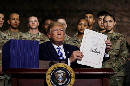 China angered at new U.S. defense act, to assess content