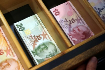 Turkish lira edges up from record low on central bank pledge