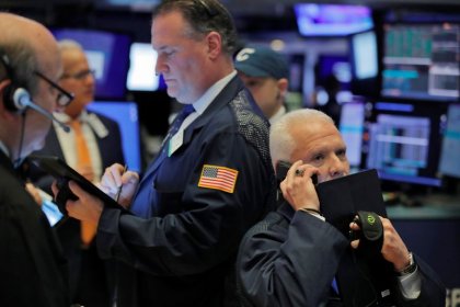 Stocks surge to record highs on hopes virus is peaking, gold ebbs
