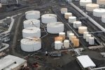 Oil rises after 18-year lows prompt U.S.- Russia talks plan