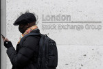 UK shares close at near three-month highs, mark strong weekly gains