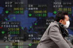 Asian shares mixed as corporate earnings loom