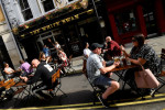 England to set tough new socialising rules after virus spike
