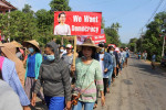 Myanmar protesters paint Yangon red, defying bloody army crackdown