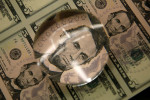Dollar edges up before U.S. inflation data