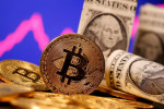 マスク氏、テスラ車購入でビットコインの使用停止 気候巡る懸念で