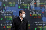 World stocks up, dollar dips as Fed officials calm inflation fears