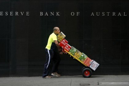 Australia cuts rates to historic lows to head off deflation