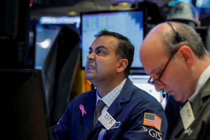 Dow, S&P fall as earnings season picks up; tech boosts Nasdaq
