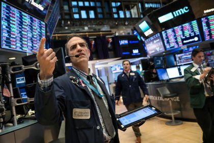 Wall Street hit by Apple and internet shares, trade worries