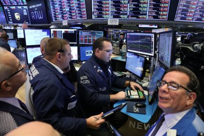 Retail warnings, tech tumble hit Wall Street