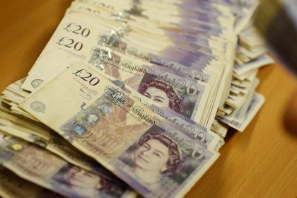 Sterling rallies as PM May's Brexit deal defeat fuels uncertainty