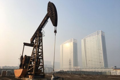 Oil prices hit 2019 highs amid supply cuts, trade talk hopes