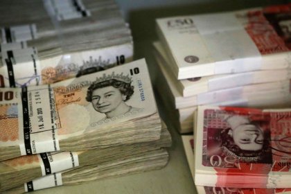 Pound hammered after May requests short Brexit delay