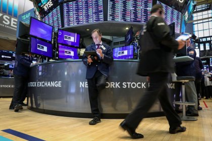 S&P 500, Nasdaq hit record closing highs on upbeat earnings