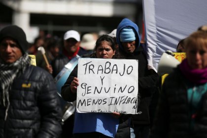 Argentine markets hold steady as anti-Macri protesters decry austerity, rising poverty