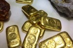Vàng thế giới đảo chiều sau khi rớt mốc 1,300 USD/oz