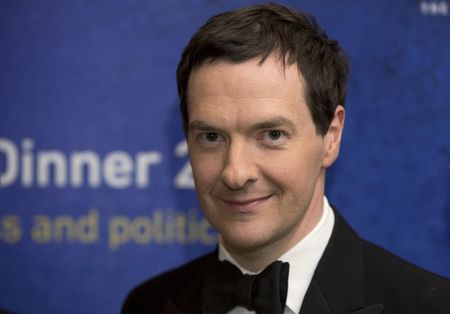 © Reuters. Britain's Chancellor of the Exchequer George Osborne poses for photographs before delivering a speech at the CBI annual dinner in London