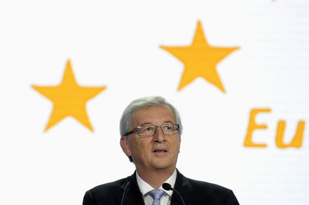 © Reuters. Juncker reacts on provisional results for the European Parliament elections at the European Parliament in Brussels