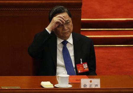 © Reuters. Yu Zhengsheng, Chairman of the CPPCC National Comittee gestures during the closing ceremony of the Chinese National People's Congress  at the Great Hall of the People, in Beijing