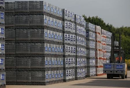 © Reuters. A fork lift truck operator drives through the storage area at the Wienerberger Brick Factory in Dosthill