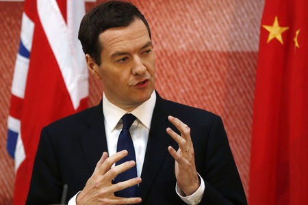 © Reuters. Britain's Chancellor of the Exchequer George Osborne addresses delegates at the UK-China Financial Forum at Lancaster House, in London